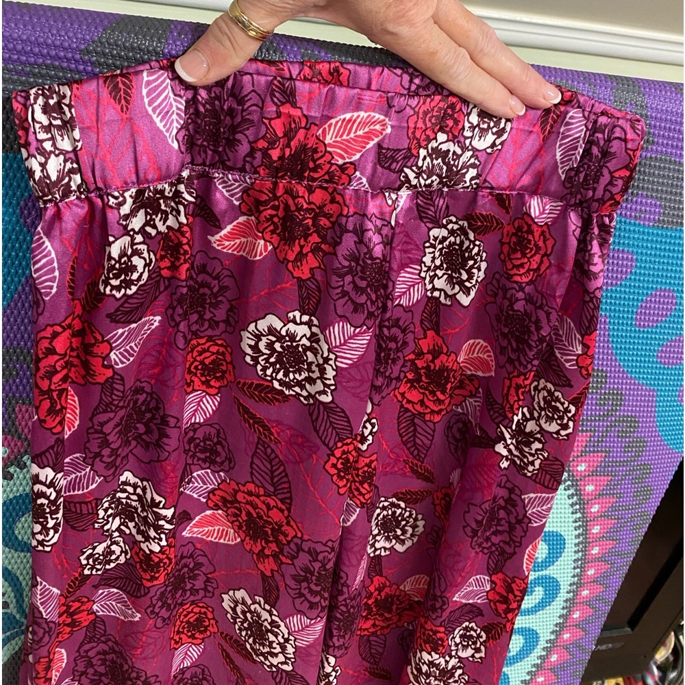Nasty Gal size 2 gorgeous pink floral satin pants w ruffled slits @ sides; EUC.